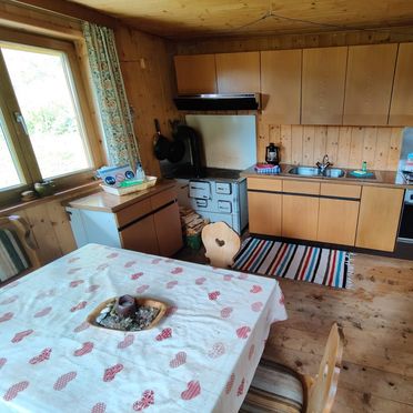 Kitchen with living area, Oberpranterhütte, Meransen, Trentino-Alto Adige, Italy